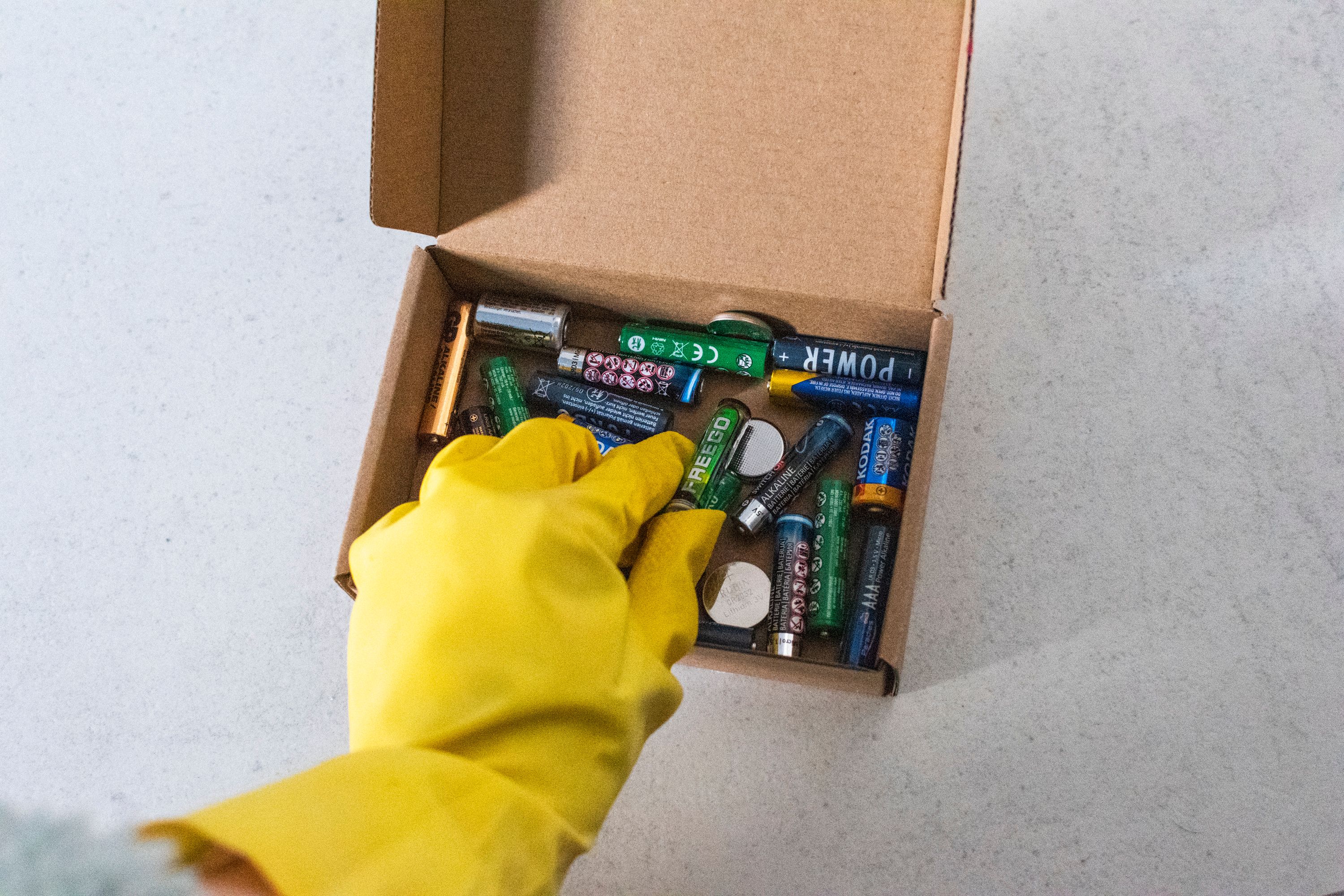Dangerous goods freight — hazmat labels on palletised cargo at a Spanish logistics facility